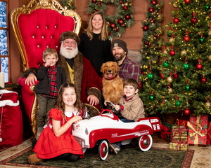 family with dog for Santa photos